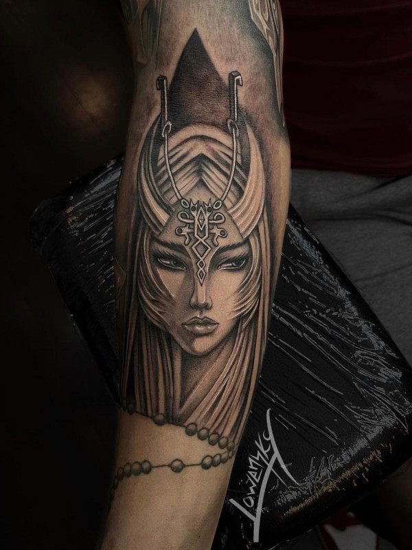 Calf black and grey fine line tattoo portrait of a fantasy girl with horns by Lowensky Santiago of Sacred Mandala Studio in Durham, NC.